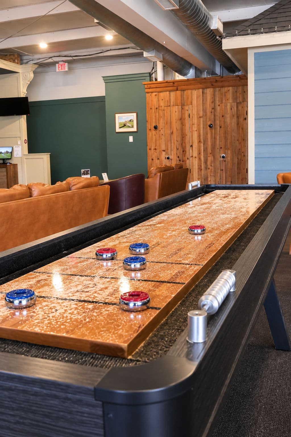 The shuffleboard table in The Golf House lounge