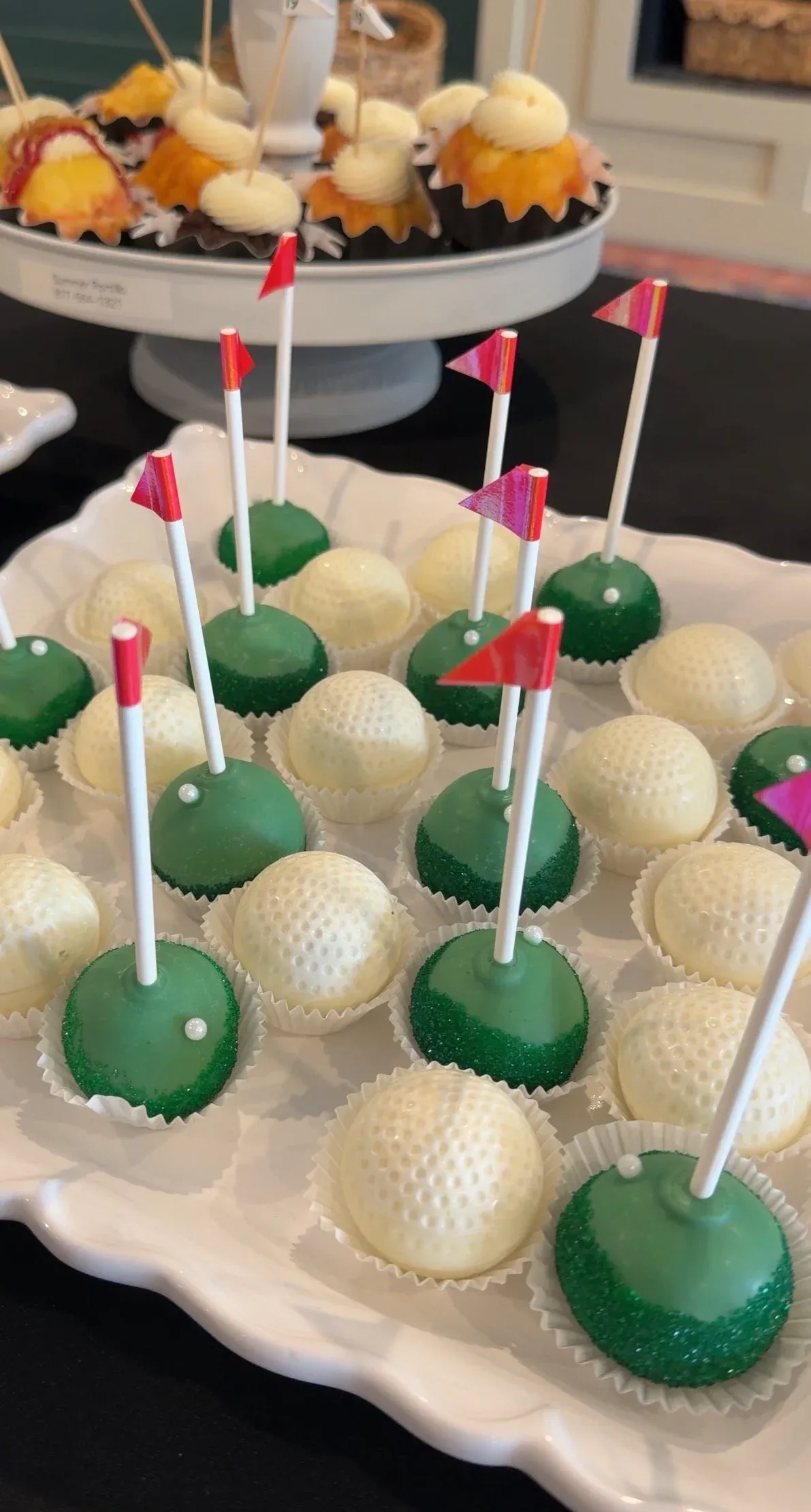 Golf-themed cake pops at a party